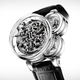 Illustration for article titled This Watch Explodes and Reconfigures Itself Every Hour Just to Tell You the Time